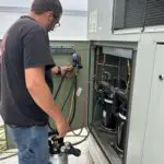 Open control panel with relays, terminal blocks, and wiring