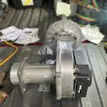Small inducer motor with a round housing and wiring