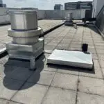 Round rooftop exhaust fan with the cover removed
