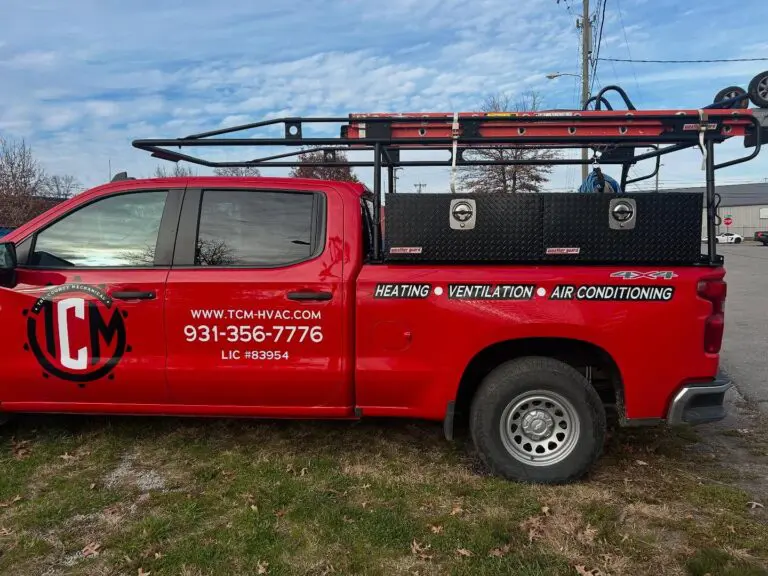 White Tri-County Mechanical service truck parked outside